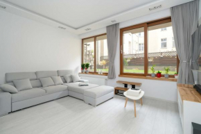 Piekny Apartament z Ogrodkiem i Tarasem & Parking by Noclegi Renters